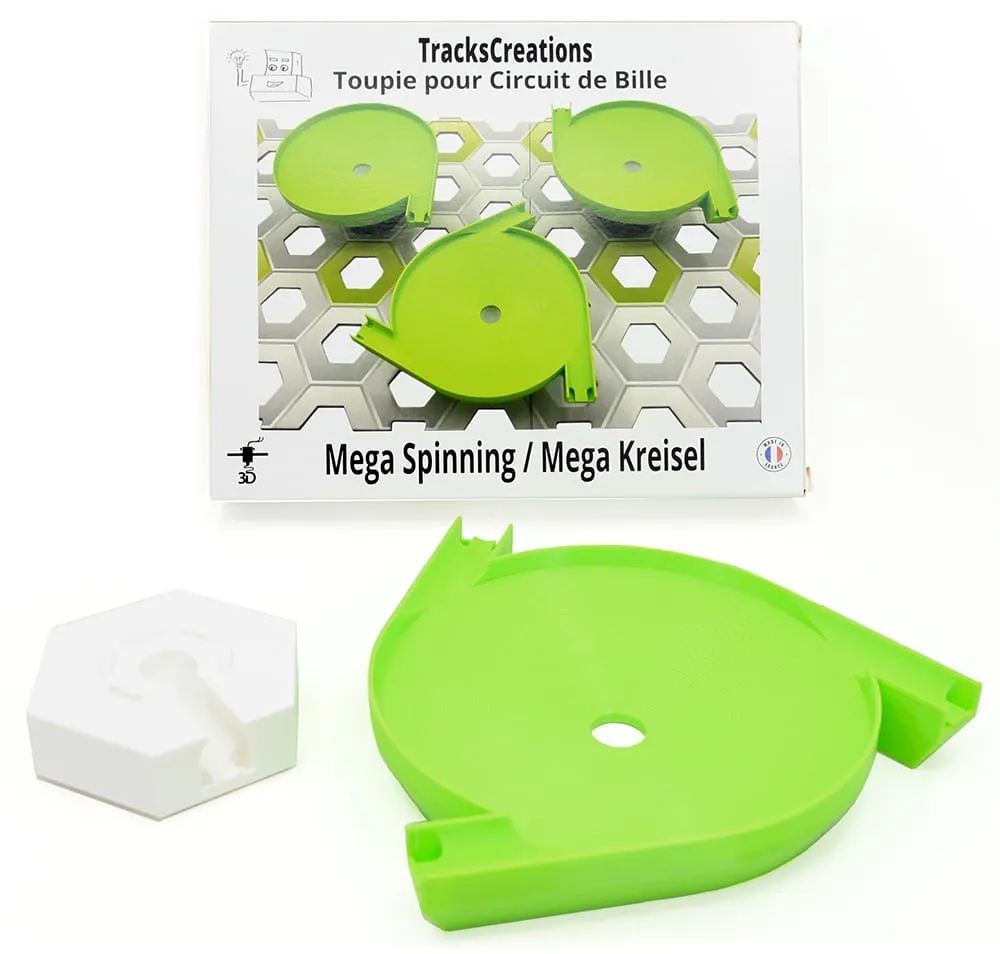 Méga toupie triple entrée verte et son support blanc devant la boîte TracksCreations