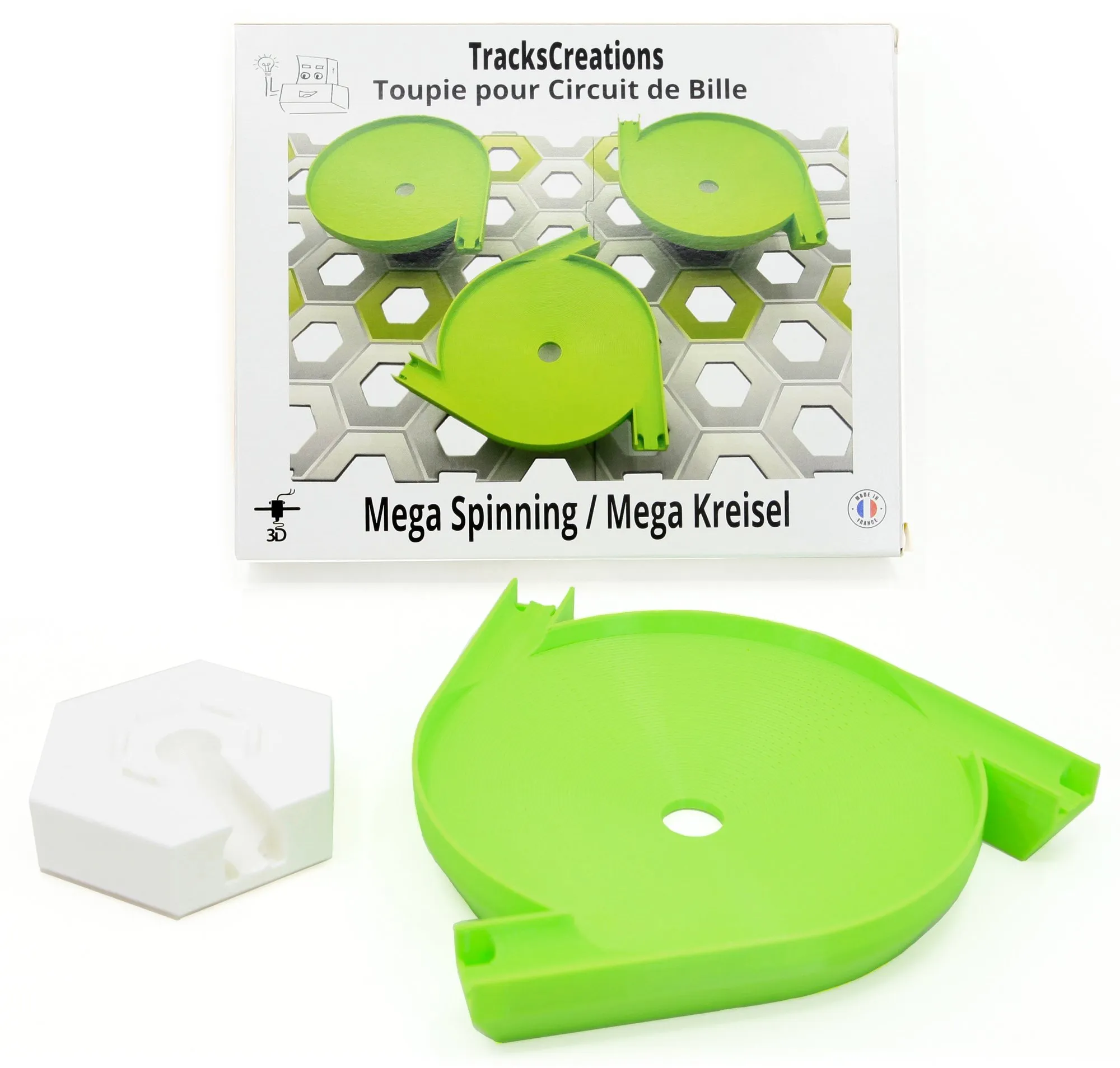 Toupie entonnoir 3 entrées verte et son support blanc devant la boîte TracksCreations