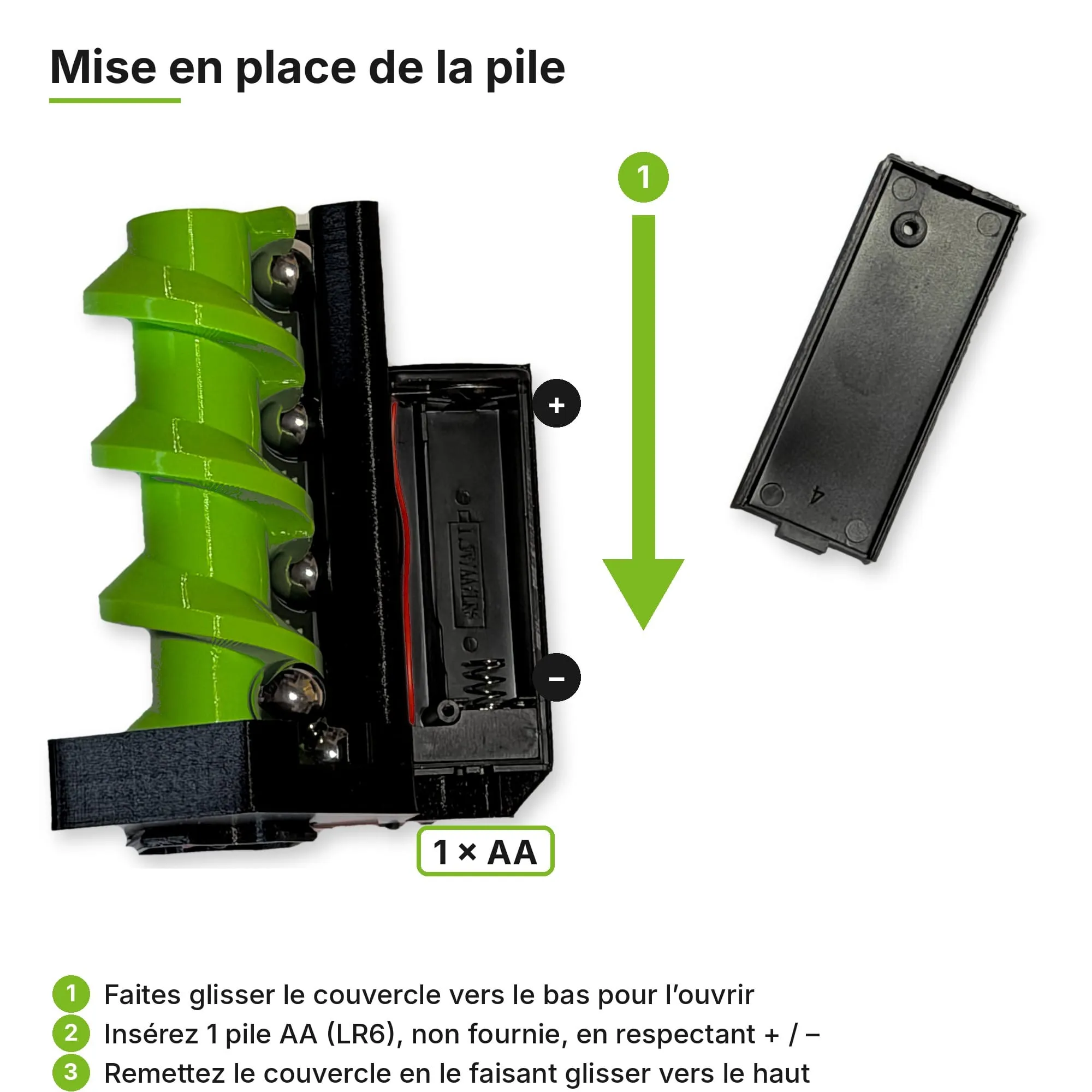 Mise en place de la pile AA dans le boîtier à l’arrière de l’ascenseur à billes