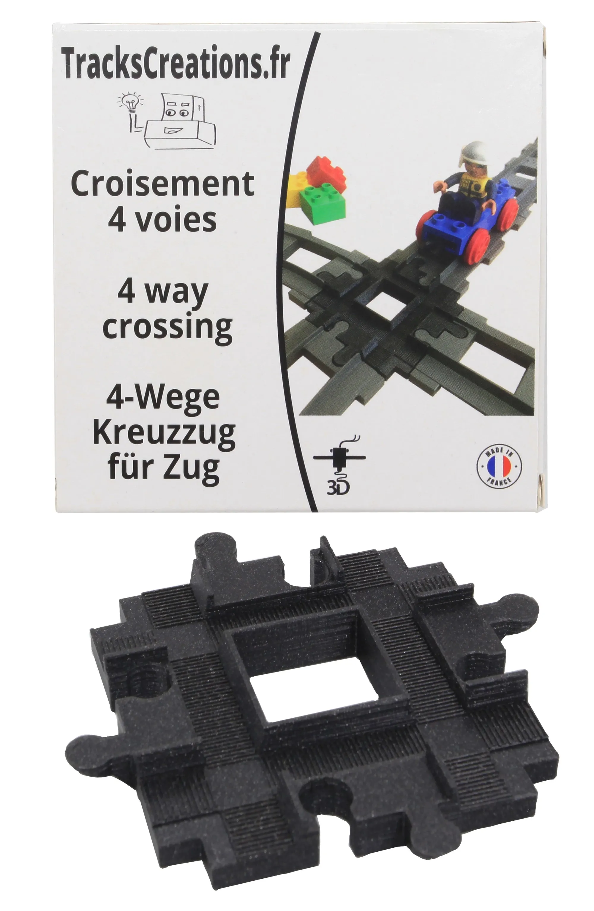 Croisement 4 voies noir devant sa boîte TracksCreations
