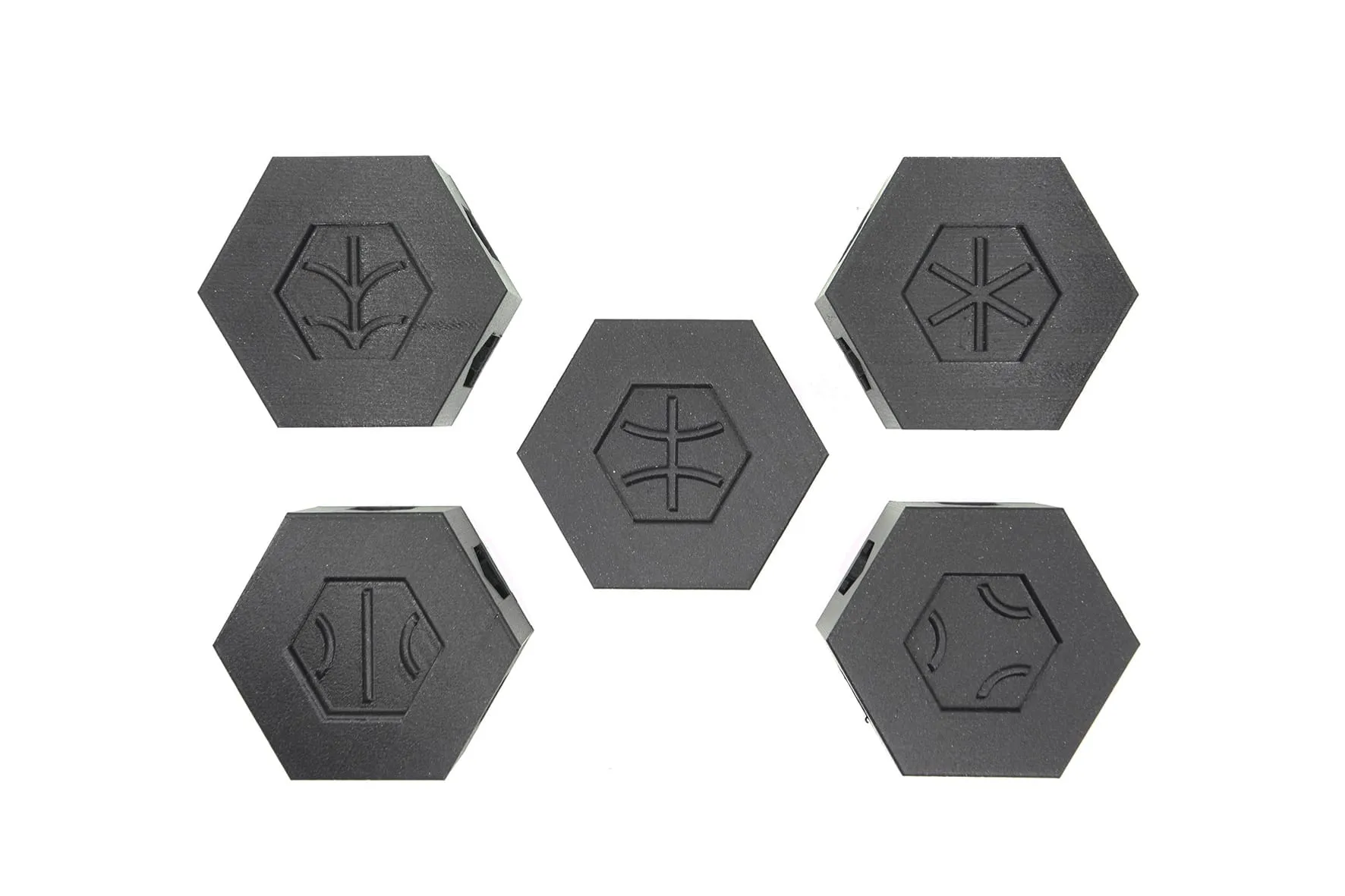 Les cinq tunnels noirs hexagonaux vus de dessus sur fond blanc